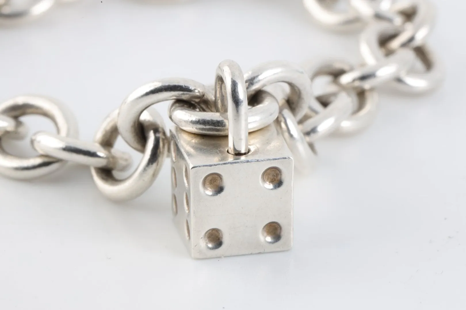 7.5" Tiffany & Co. 925 Silver Dice Charm Bracelet (40.23g.)