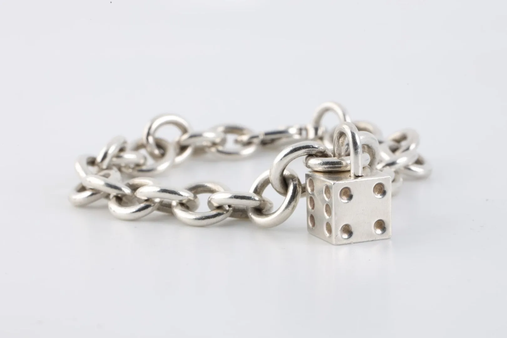 7.5" Tiffany & Co. 925 Silver Dice Charm Bracelet (40.23g.)