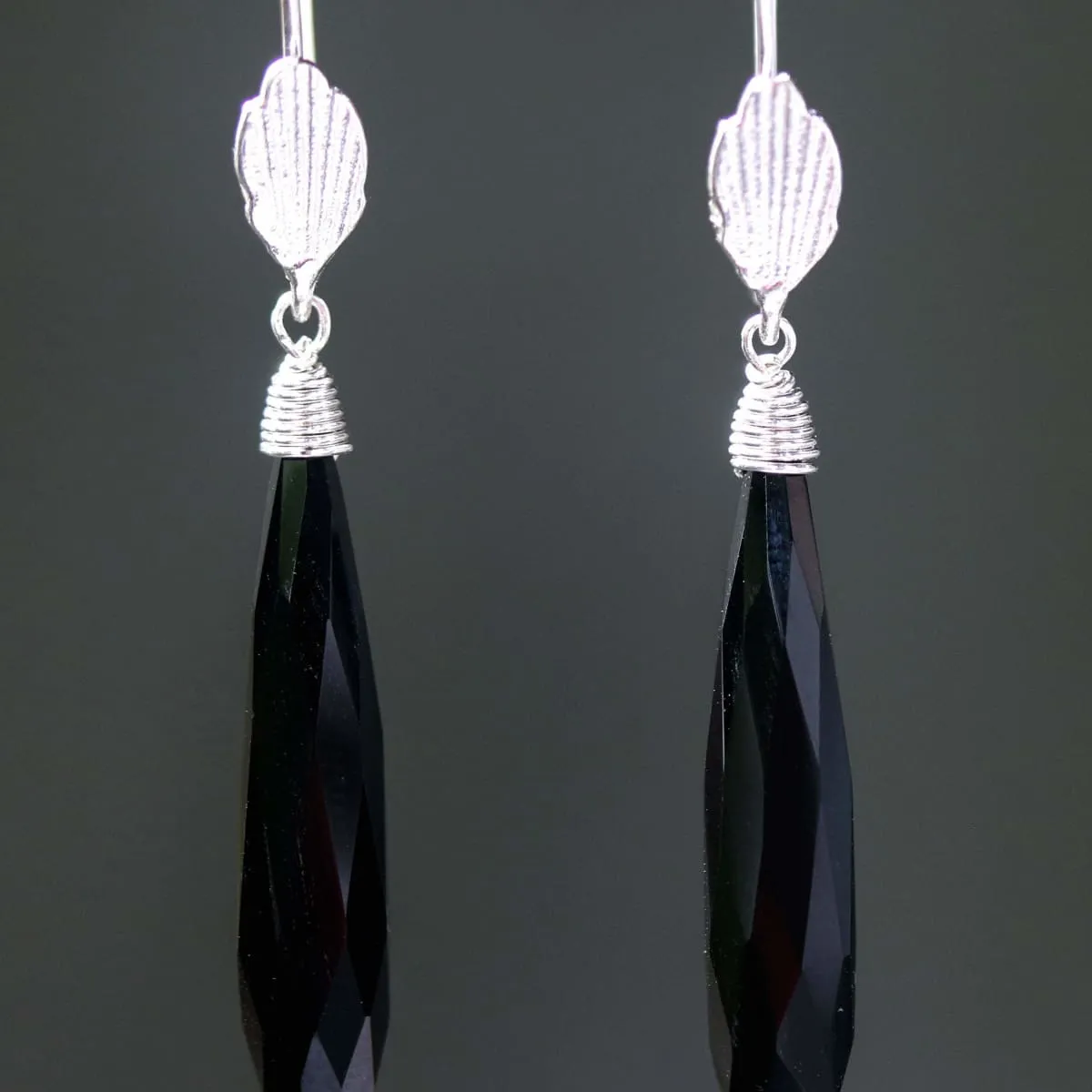 Black onyx earrings with silver wire wrapped on sterling silver hooks leaf design style