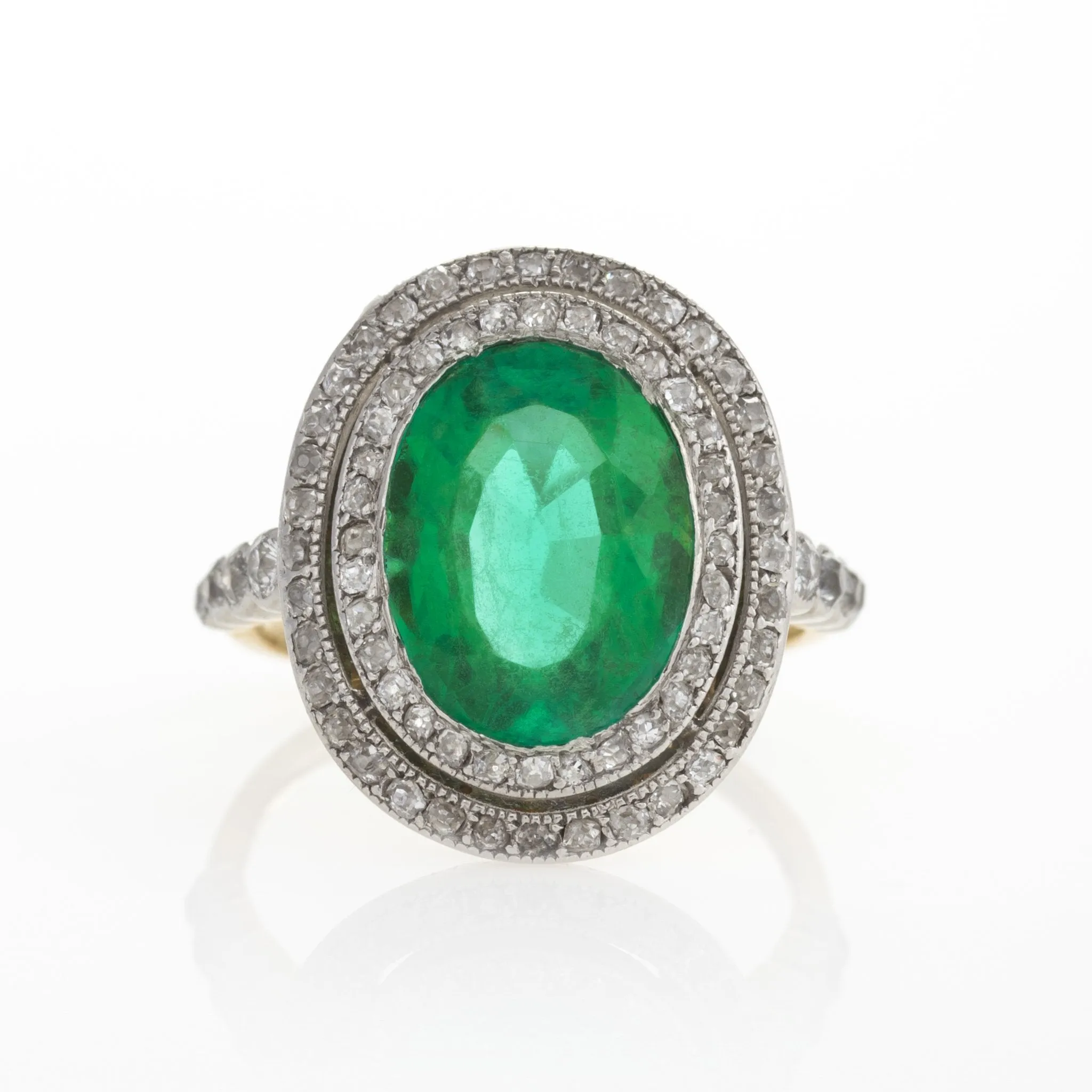 Colombian Emerald and Diamond Halo Ring