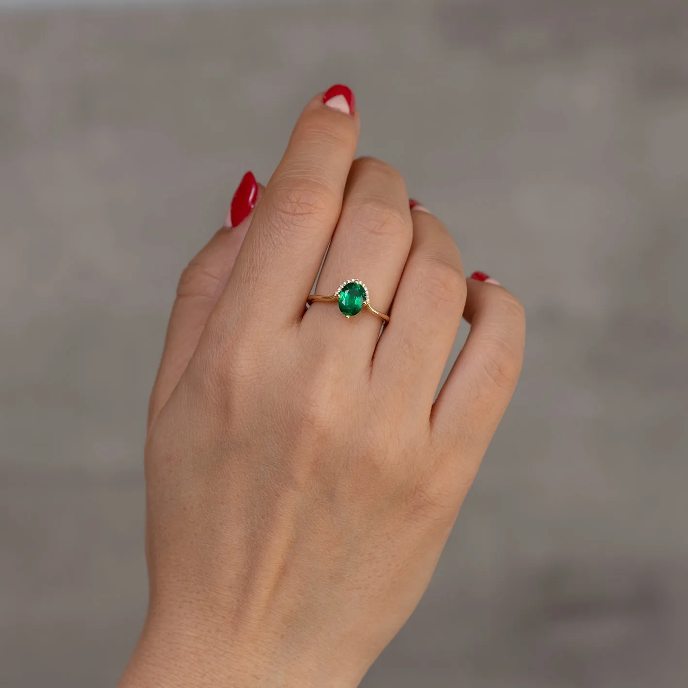 Floating Oval-Cut Emerald Engagement Ring