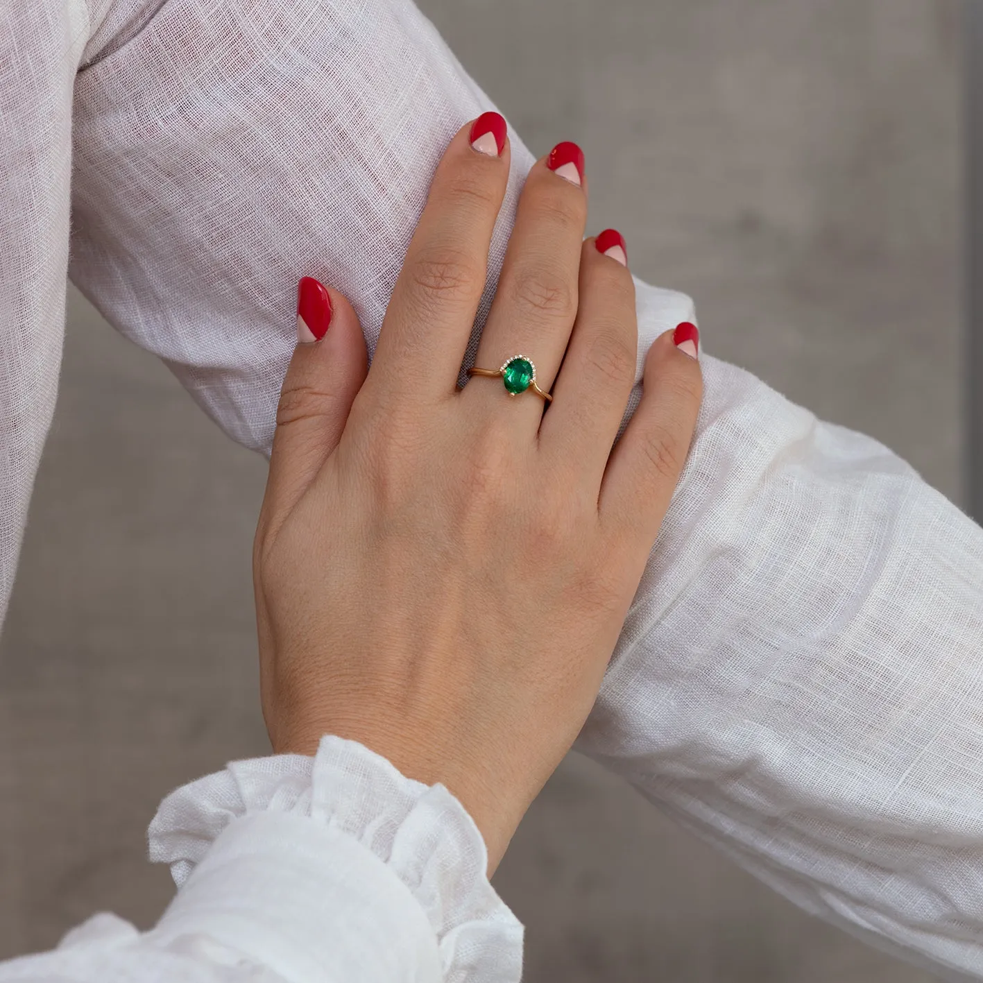 Floating Oval-Cut Emerald Engagement Ring