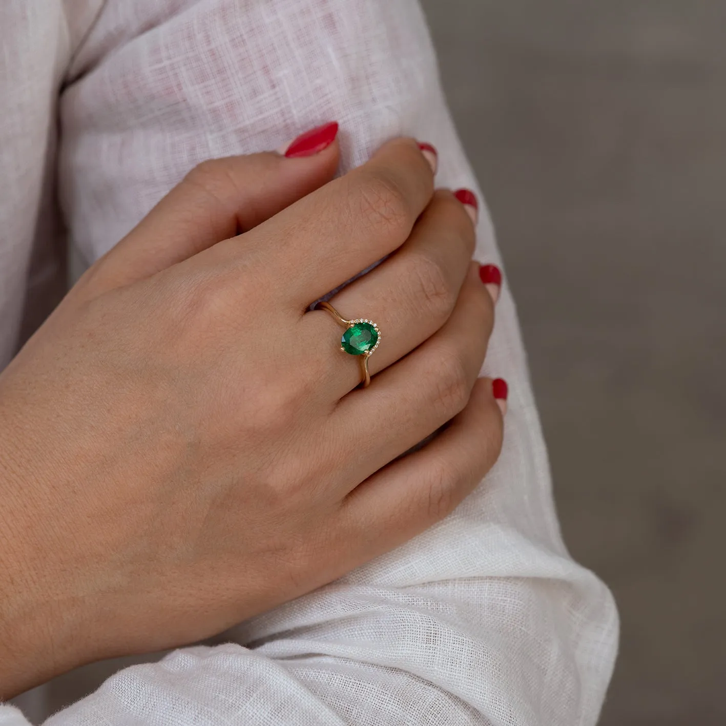 Floating Oval-Cut Emerald Engagement Ring