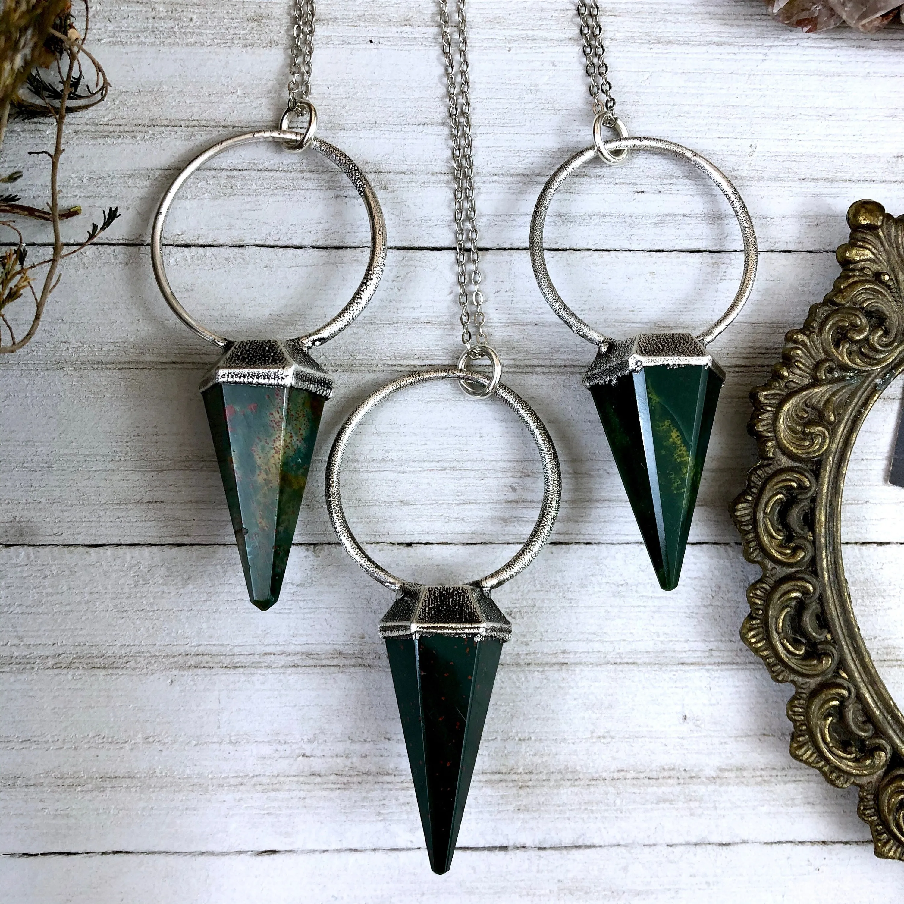 Elegant Silver Crystal Pendulum Necklace with Bloodstone Accent